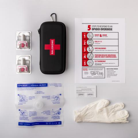 Services & Rates A naloxone kit with nasal spray, latex gloves, and instructions